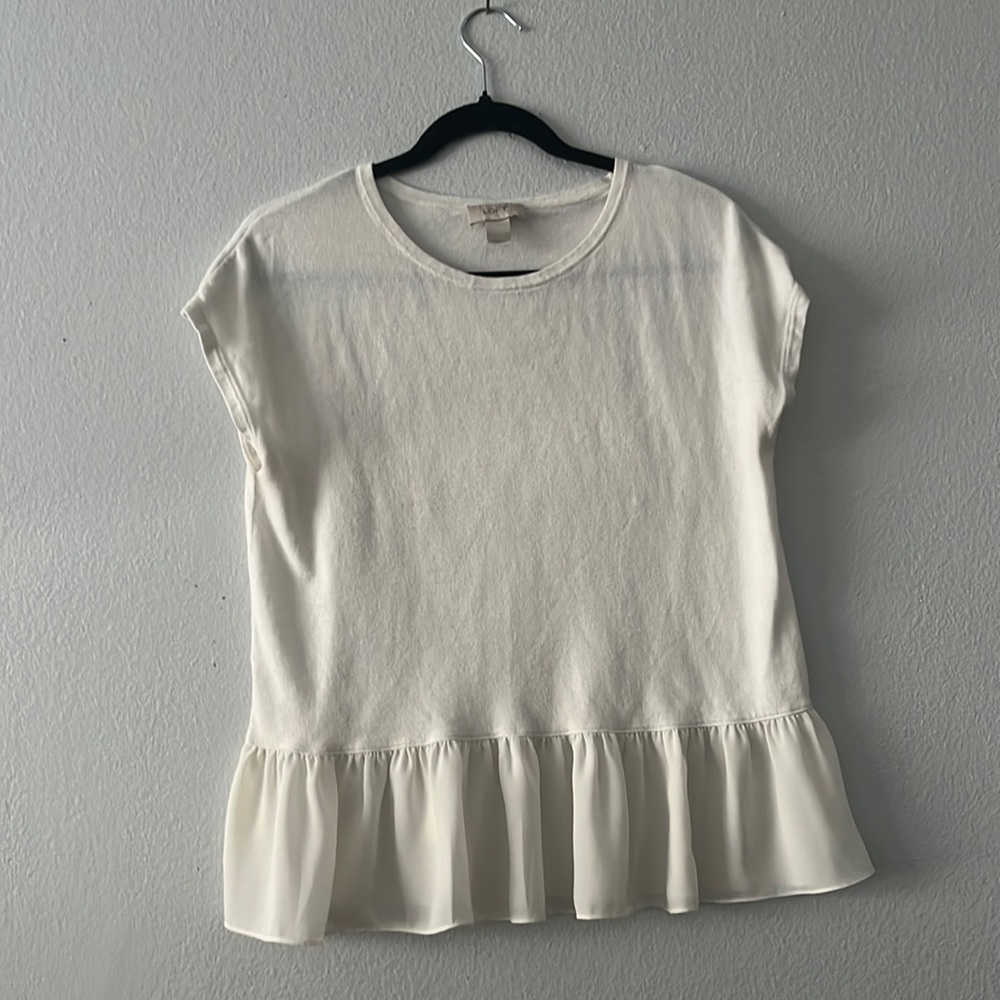 white short sleeve with mesh ruffle bottom